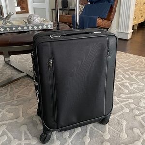 SOLD!!     Tumi Arrivé Continental Dual Access 4 wheeled Carry On